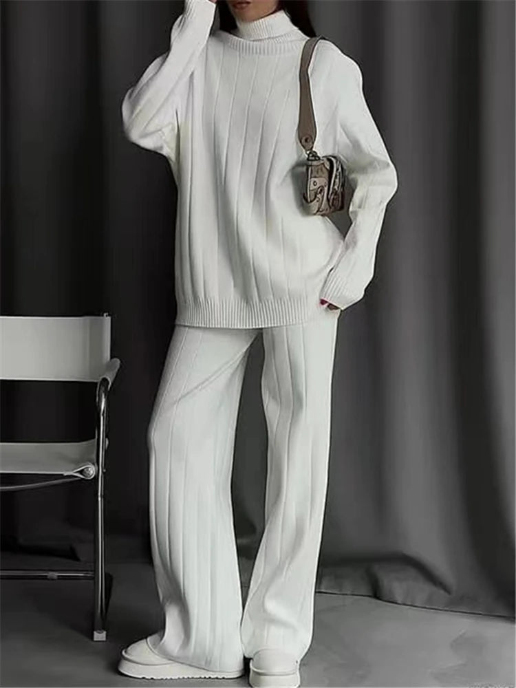 Conjunto de chándal de punto blanco para mujer de Glow, suéter de cuello alto y pantalón recto para otoño e invierno 2023.