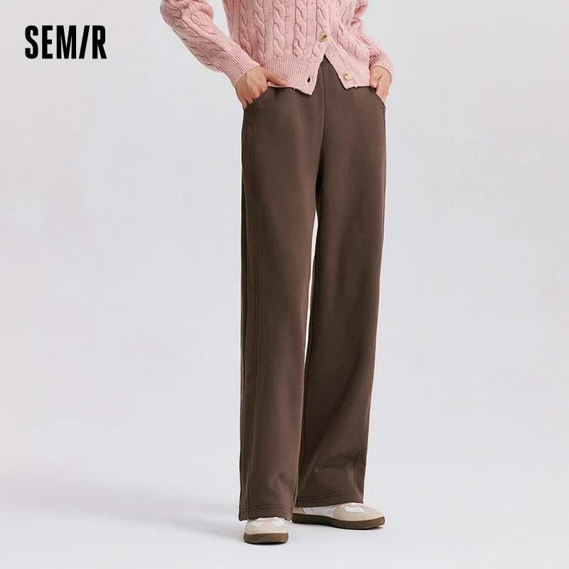 Pantalones térmicos antibacterianos para mujer, de pierna ancha, en color liso con forro polar, marca Glow, moda invierno 2024.