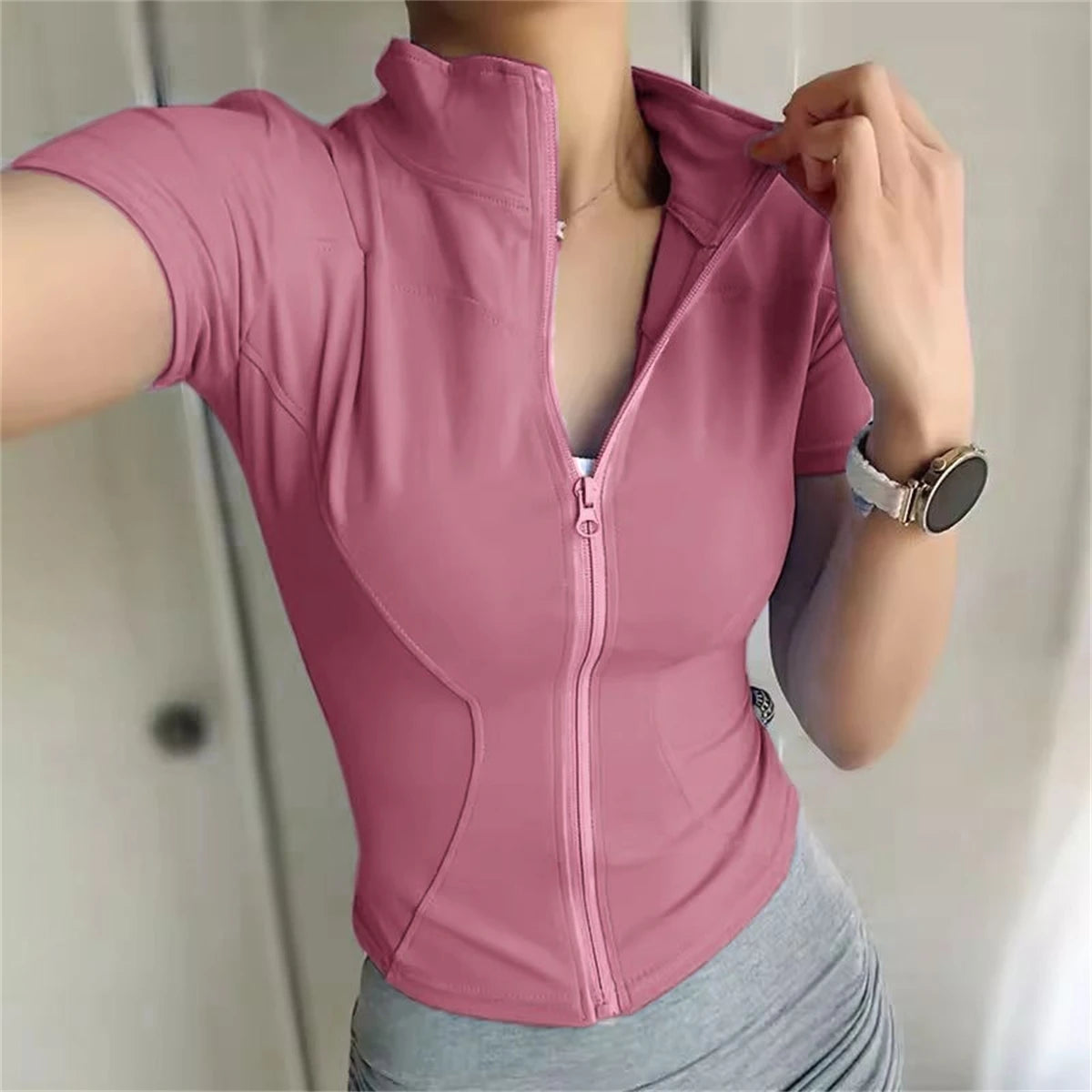 Chaqueta deportiva ajustada para mujer de Glow, top de manga corta con cremallera, ideal para correr, yoga y ciclismo en verano.