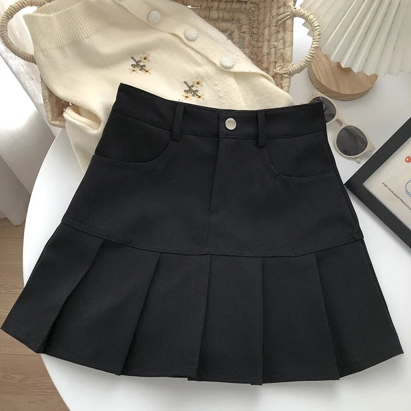 Falda plisada vintage Y2K de cintura alta para mujer, estilo universitario y calle coreana, de la marca Glow, en color negro.