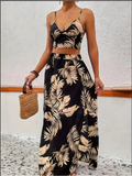 Vestido elegante sin mangas de Glow con cuello en V profundo, falda estampada y chaleco, ideal para verano y moda tendencia.