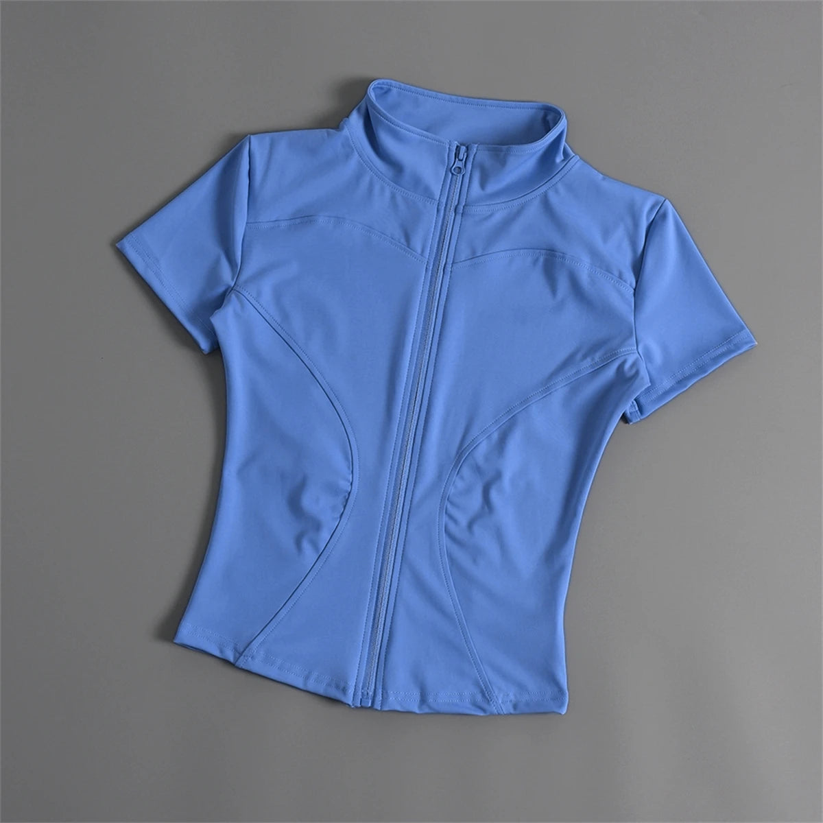 Chaqueta deportiva de verano Glow para mujer, abrigo ajustado de manga corta con cremallera, ideal para correr y yoga.