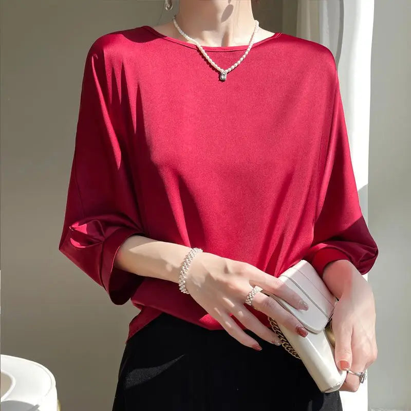 Camiseta de seda satinada de media manga en color sólido para mujer, cuello redondo y estilo informal de la marca Glow.