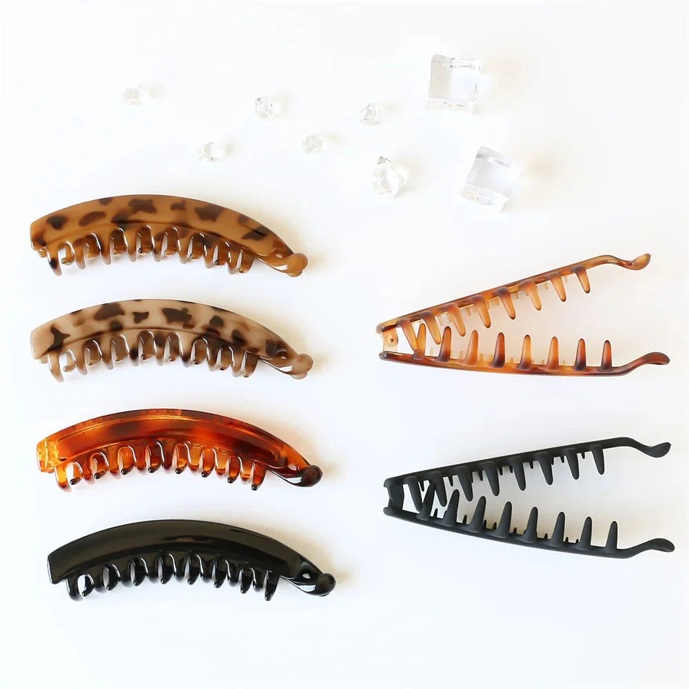 Ganchos para cabello ANZ con acabado mate en color sólido, ideales para coleta y peinados femeninos.